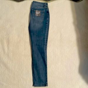 Women’s distressed straight leg jean